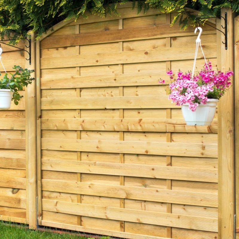 decorative-garden-fence-hanging-baskets-attached